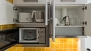 Sevilla Apartamento - Kitchenette with utensils and appliances for self-catering.