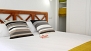 Sevilla Apartamento - The room has a built-in wardrobe to store your belongings.