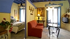 Sevilla Apartamento - Sala de estar con sofá-cama.