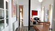 Seville Apartment - Entrance view. The apartment retains its original floors and the ceilings are 3.80 metres high.