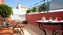 Séville Appartement - Wonderful private terrace filled with plants and garden furniture.