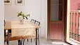 Seville Apartment - Dining area with seating for up to four.