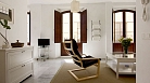 Seville Apartment - Loft-style apartment with three large windows overlooking Quirós Street.