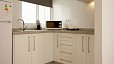 Seville Apartment - The kitchen is equipped for self-catering.