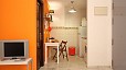 Seville Apartment - The open-plan kitchen is adjacent to the living area.