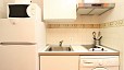 Seville Apartment - The kitchen is small but well equipped with appliances and utensils for self-catering.