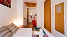 Granada Apartment - View from the sleeping area towards the sofa and kitchenette.