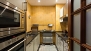 Séville Appartement - Modern, fully-equipped kitchen with oven, washing machine and dishwasher.