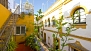 Seville Apartment - A steep iron stairway leads from the lower terrace to the roof-top terrace.