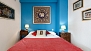 Seville Apartment - Upper bedroom with queen size bed (160 x 200 cm).