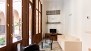 Sevilla Apartamento - The living room is furnished with an armchair, a sofa and a central table (ground floor).