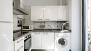 Séville Appartement - Kitchen equipped with all main utensils and appliances. With oven and washing machine.