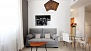 Séville Appartement - Living area. The sofa converts into a single bed for an additional guest.