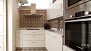 Sevilla Ferienwohnung - The kitchen includes: fridge-freezer, stove, oven, microwave, dishwasher and washing machine.