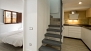 Séville Appartement - Stairs lead to bedroom 2 and bathroom 2.