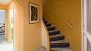 Seville Apartment - Stairs lead to the upper level with: bedroom Nº 3, living room, kitchen and terrace.