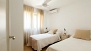 Sevilla Apartamento - Bedroom 2 with twin beds.