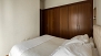 Sevilla Apartamento - Bedroom with a large built-in wardrobe.