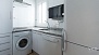 Sevilla Ferienwohnung - Well equipped kitchen with washing machine and dishwasher.
