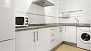 Sevilla Ferienwohnung - The kitchen is fully equipped for self-catering - with washing machine (lower floor).