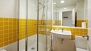 Seville Apartment - Bathroom with washbasin, toilet and shower.