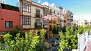 Seville Apartment - View from the window over Feria street.