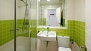 Seville Apartment - Bathroom with washbasin, toilet and shower.