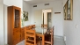 Sevilla Ferienwohnung - Dining room with table and chairs.