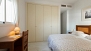 Sevilla Ferienwohnung - Bedroom 1 has a large fitted wardrobe.