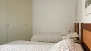 Sevilla Apartamento - Bedroom 2 includes a large fitted wardrobe.