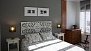 Seville Apartment - The master bedroom features a double bed.