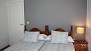 Seville Apartment - The second bedroom features twin beds.
