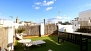 Sevilla Apartamento - Furnishes include 2 deck chairs, parasol, table and 2 sitting benches.