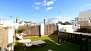 Seville Apartment - Furnishes include 2 deck chairs, parasol, table and 2 sitting benches.