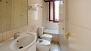 Seville Apartment - Modern bathroom with bathtub.