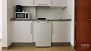 Seville Apartment - Small kitchenette well-equipped with appliances and utensils for self-catering.