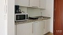 Sevilla Ferienwohnung - Small kitchenette well-equipped with utensils and appliances for self-catering.