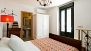 Seville Apartment - Bedroom. The door opens to the terrace.