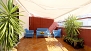 Sevilla Apartamento - Private terrace with a large canopy to give shade.