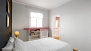 Seville Apartment - Bedroom. The window faces a quiet exterior patio.