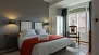 Sevilla Apartamento - Bedroom 1 features a double bed and wardrobe.
