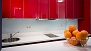 Seville Apartment - Open-plan kitchen is separated from the living area by a counter.