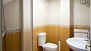 Seville Apartment - Bathroom with washbasin, toilet and shower.