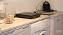 Séville Appartement - The kitchen is small but well equipped for self-catering.