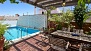 Séville Appartement - There is an inviting, shaded, eating area and pool on the lower terrace.