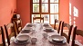 Séville Appartement - Dining room with a large table and 8 chairs - upper floor.