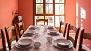 Seville Apartment - Dining room with a large table and 8 chairs - upper floor.