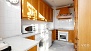 Sevilla Apartamento - The kitchen includes washing machine, dishwasher and oven - upper floor.