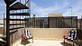 Séville Appartement - The bedroom leads out to the private terrace.