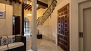 Seville Apartment - Central patio of the house. On the right you can partially see the door of the elevator.